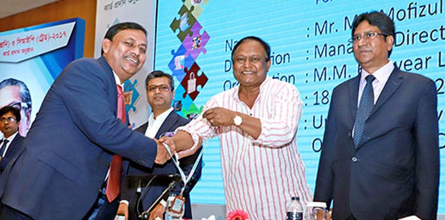 Md. Mofizul Islam, Chairman of Mamun Knitwear Ltd., receiving the CIP recognition